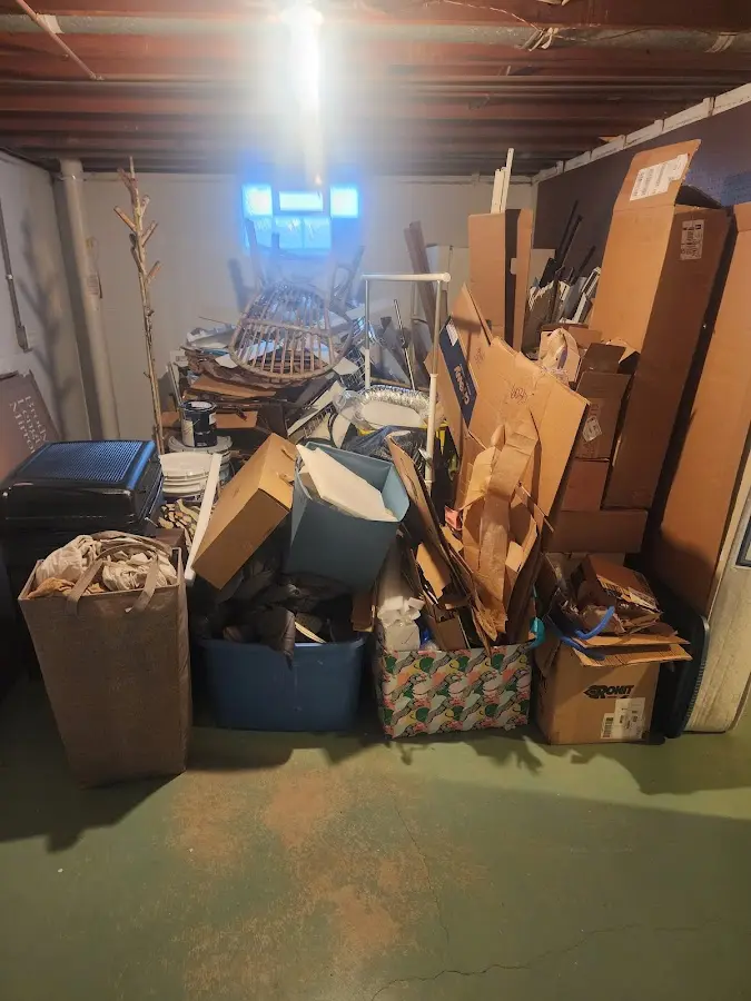 Roll-off dumpster container at job site for 15 Yard Dumpster Rental in Oakville